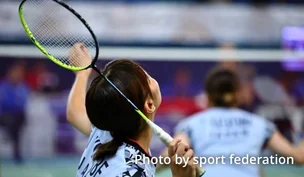 Photograph of a badminton player.