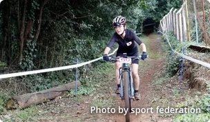 Photograph of a mountain bike athlete.