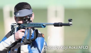 Photograph of a shooting athlete.