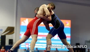 Photograph of Wrestling Greco-Roman athletes.